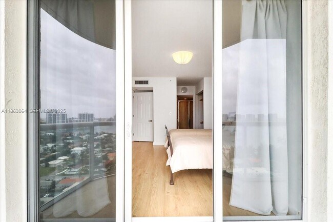 Building Photo - 18671 Collins Ave