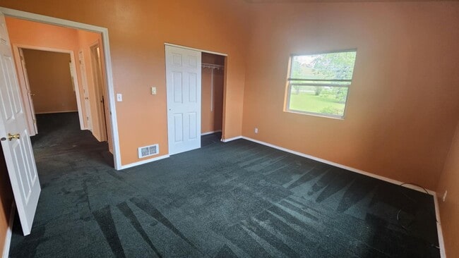 Building Photo - Out of town house with double garage and l...