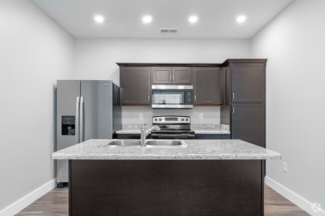 New Construction - 2BR, 2BA - 925 sf; Kitchen - Renaissance Park Apartments