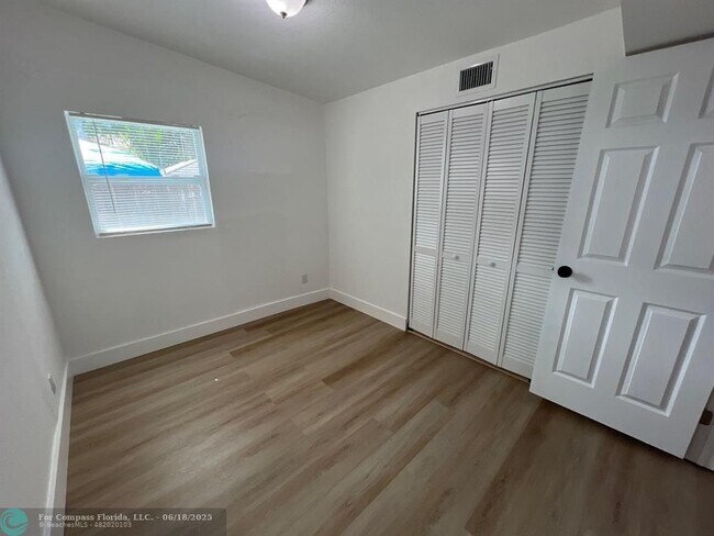 Building Photo - 10540 NW 28th Ave