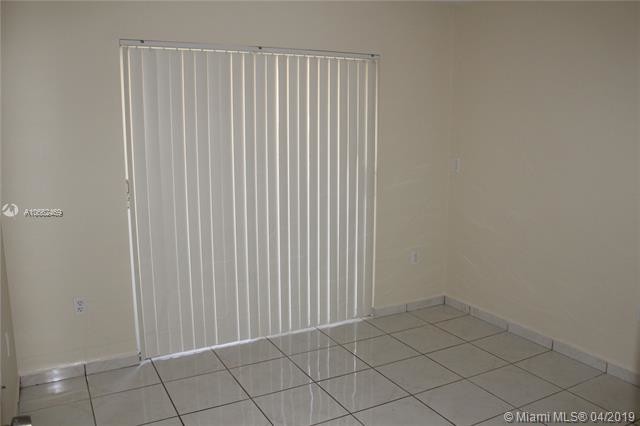 Building Photo - 4680 NW 102nd Ave  104-20