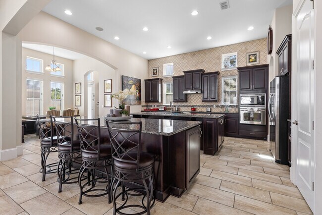 Building Photo - Luxury Waterfront Pool Home in Laureate Park | 4BR + Water Views