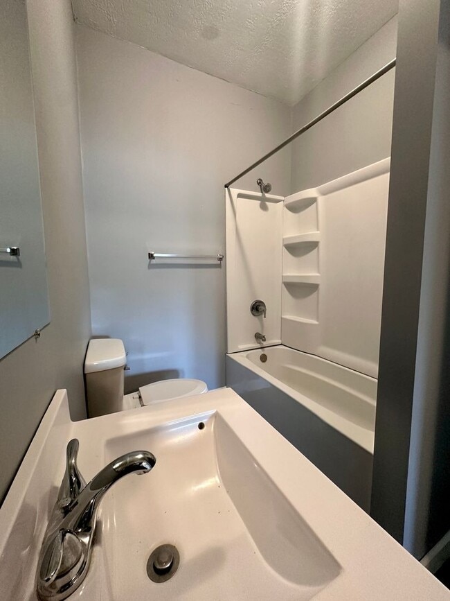 Building Photo - Step into charm, comfort, and convenience in the heart of Historic Farrington’s Grove!