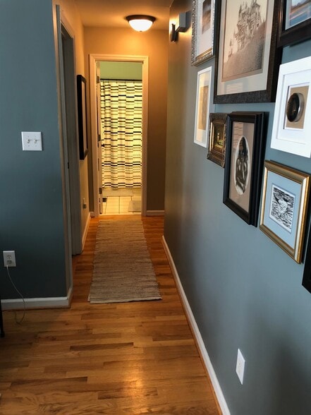 Hallway from Living Room to Bedrooms/Bathrooms - 415 St. Ives Trace