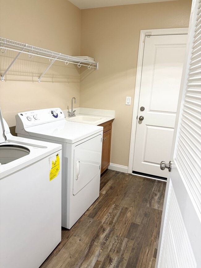Building Photo - Stylish 3-Story Townhome with Balconies & Open-Concept Living