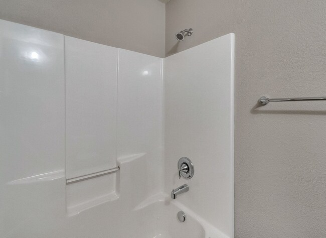 Building Photo - 2BR + 2.1BA Corner Townhome-Style Condo — Dual Primary Suites, Attached Garage & Most Utilities I...