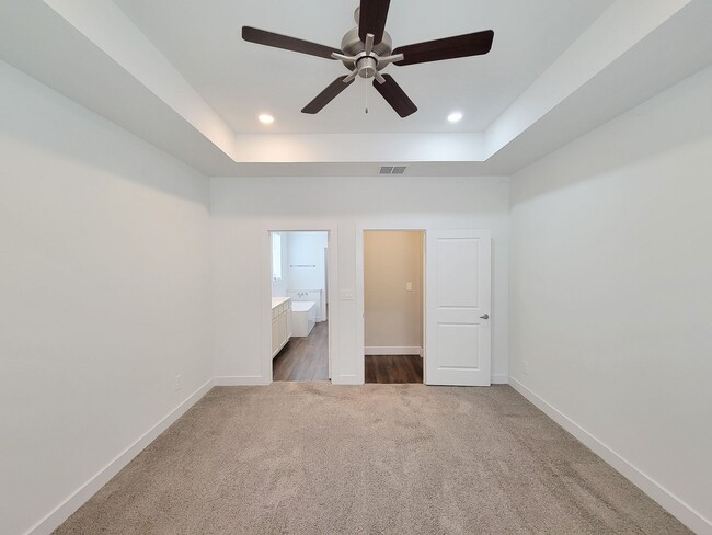 Building Photo - Very functional floor plan, has game room/home office, covered back patio on a big lot. Primary o...