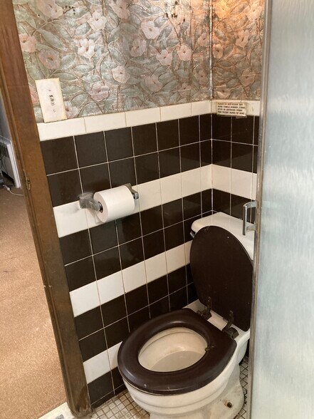 Bathroom door into kitchenette - 764 Lenore Ln