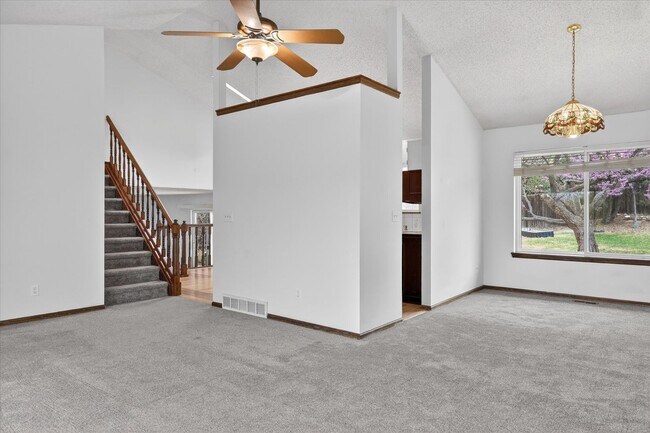 Building Photo - 4BR/4BA Updated Home with Finished Basement Suite & Landscaped Yard