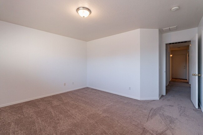 Building Photo - Three bedrooms! Fresh Carpet and Paint!