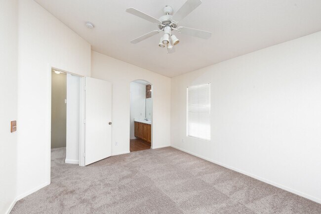 Building Photo - Two bedroom townhome with garage in gated ...