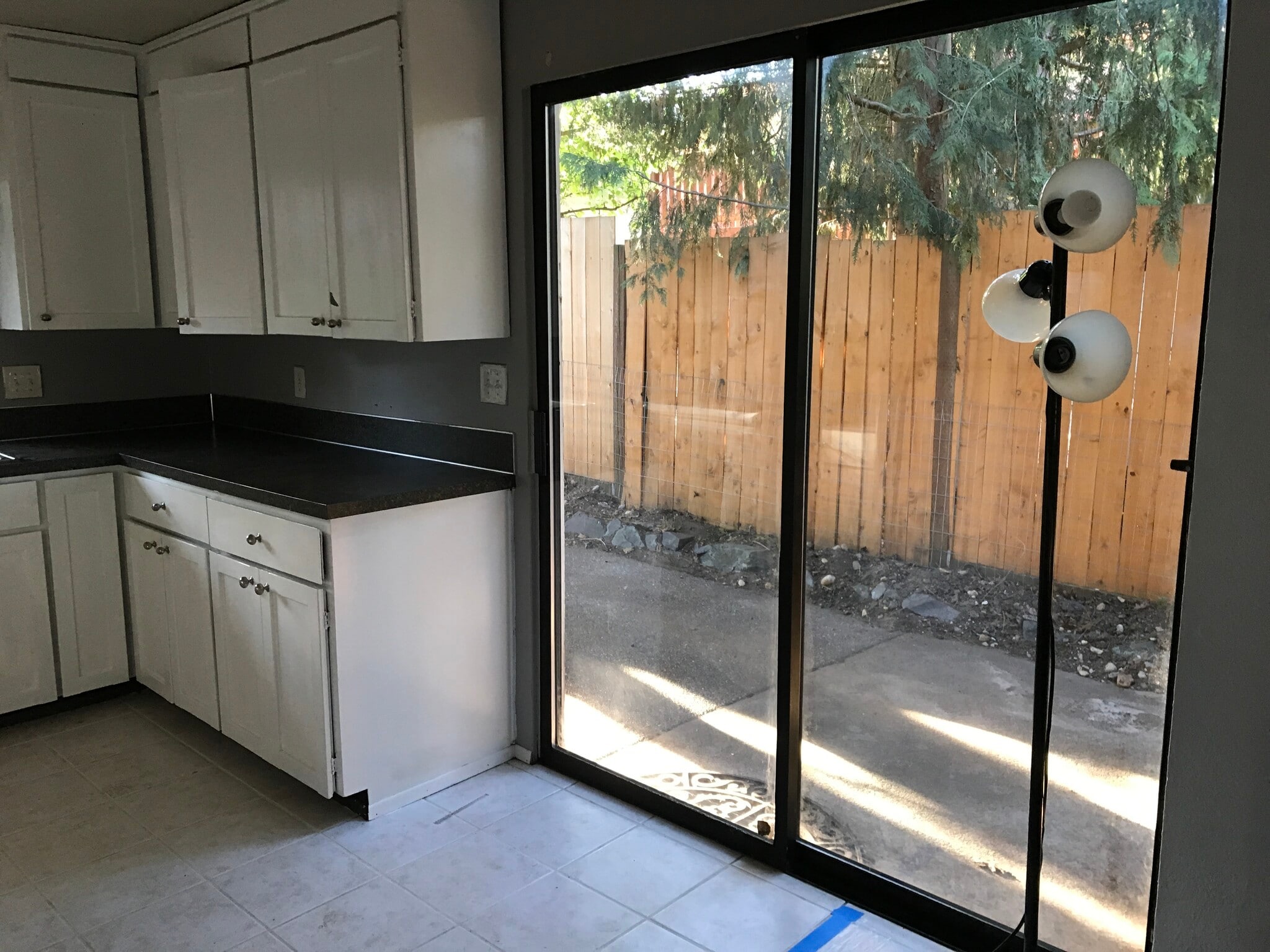 7834 Sliding door to fenced yard - 7834 Custer Rd W