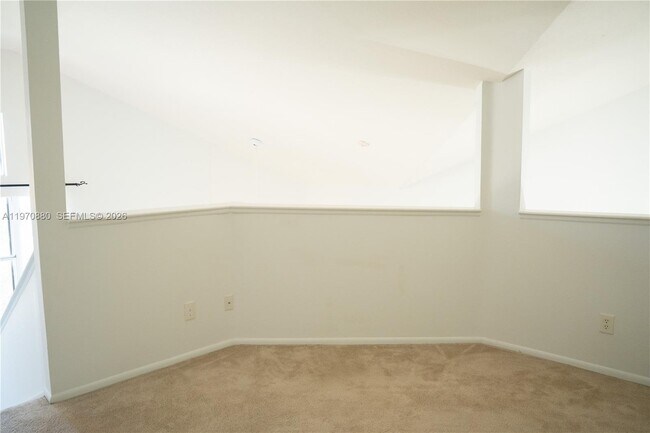 Building Photo - 1865 Palm Cove Blvd