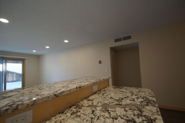 Building Photo - Modern First-Floor One Bedroom with In-Unit Laundry