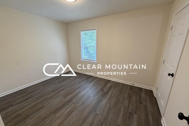 Building Photo - Downtown Greer Living! Renovated 2BR Townhome with Modern Finishes