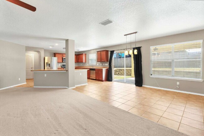 Building Photo - "Spacious 4-Bedroom Sanctuary with 3 Full Baths and Solar Panels!"