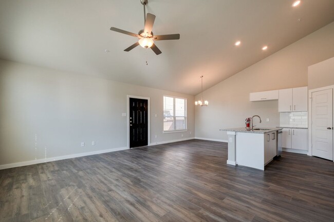 Building Photo - GORGEOUS 3 BEDROOM FOUR PLEX LOCATED IN MI...