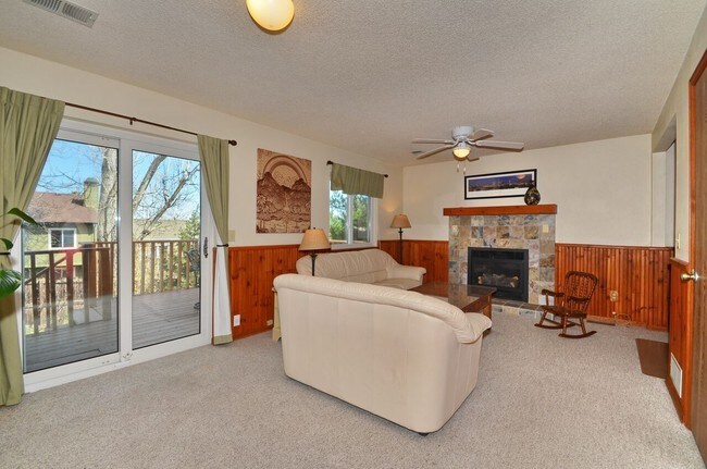 Building Photo - Fantastic 4BR, 3.5BA! Deck, FP, great yard, location!! (Regal)