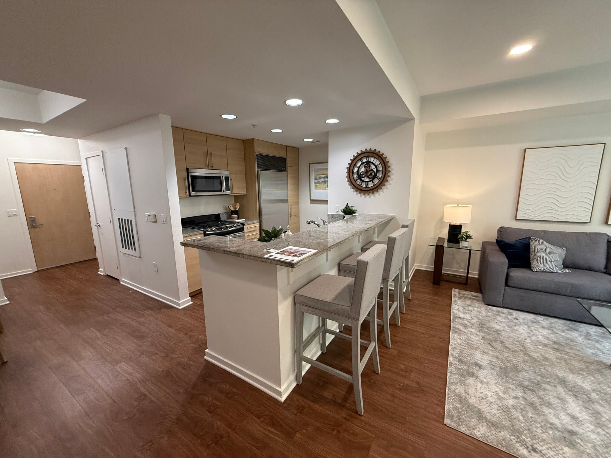 A fully equipped kitchen featuring premium appliances, including a state-of-the-art Sub-Zero refrige - 1655 N California Blvd