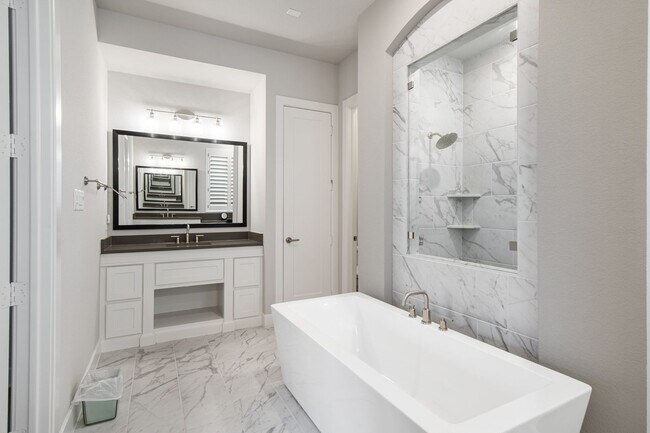 Building Photo - Stunning 4-Bedroom Luxury Residence with Bonus Office in the Prestigious Walsh Community LIKE NEW!