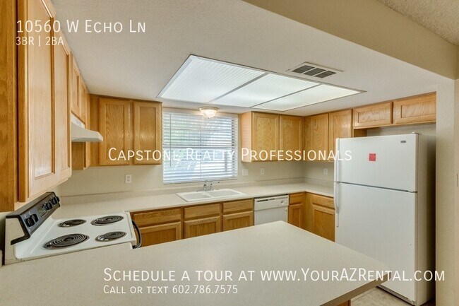Building Photo - 10560 W Echo Ln