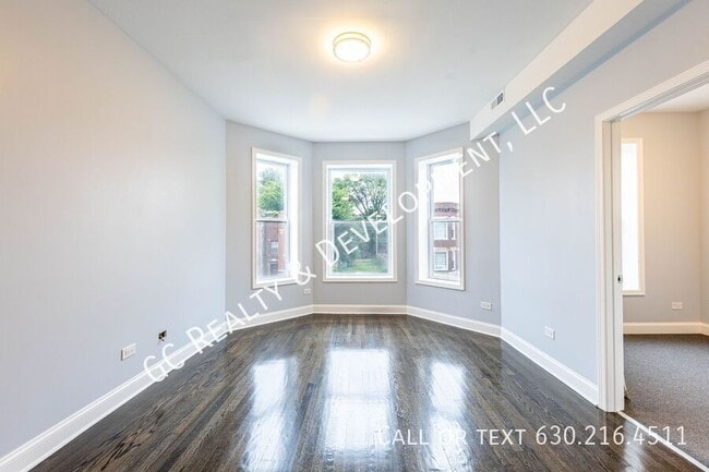 Building Photo - 6433 S Vernon Ave