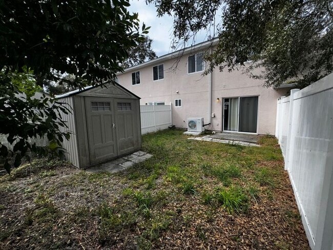 Building Photo - 3 Bedroom 2 Bath Magnolia Pointe Townhome with a Fenced backyard!