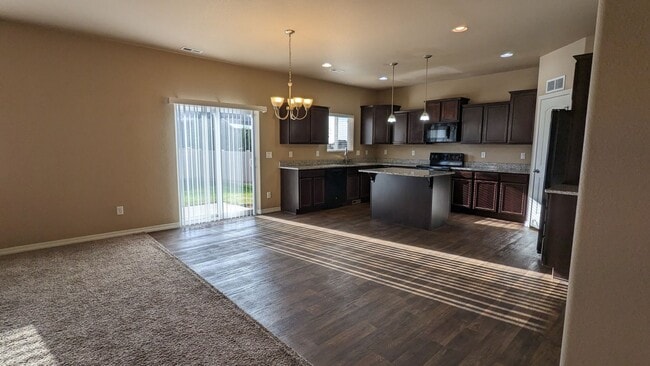 Building Photo - LARGE TWO STORY 3 BED/2.5 BATH W/3 CAR GAR...