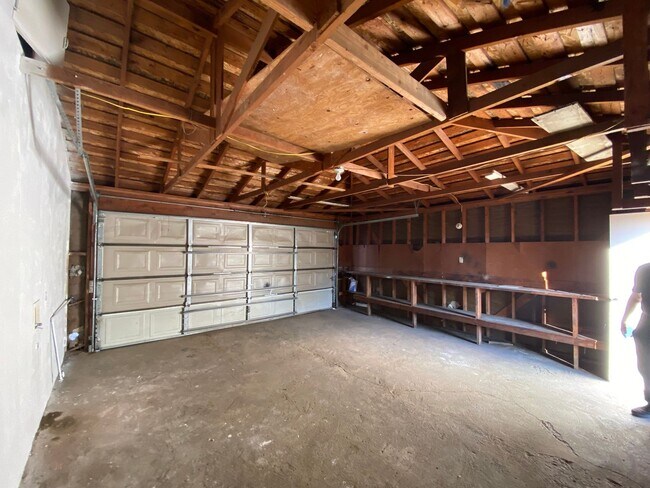 Building Photo - Hard to Find 1 BD 1 BA House with a 2 car garage and it's own yard.