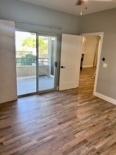 Master bedroom with track panel covering over sliding door - 2251 Wigwam Pky