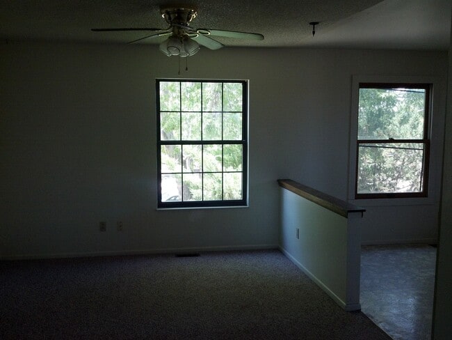Building Photo - Widefield side entry bi-level home.