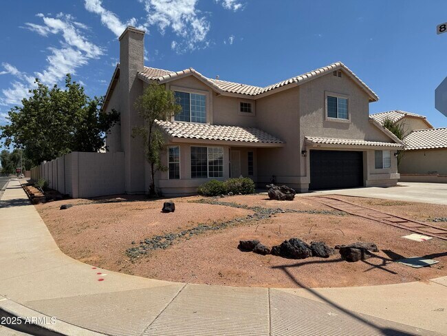 Building Photo - 8460 W Aster Dr