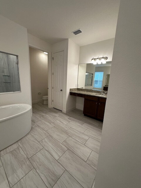 Building Photo - "Spacious Elegance in St. Cloud: 5-Bedroom...