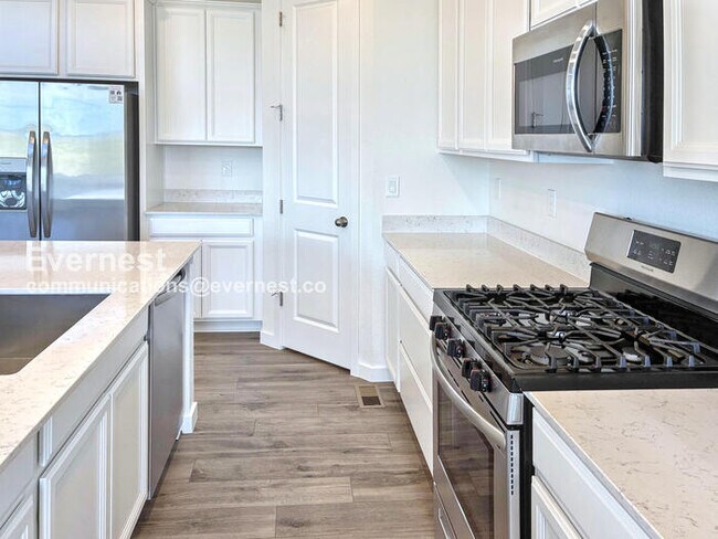 Building Photo - Spacious Home with Stainless Steel Appliances and Fenced Yard