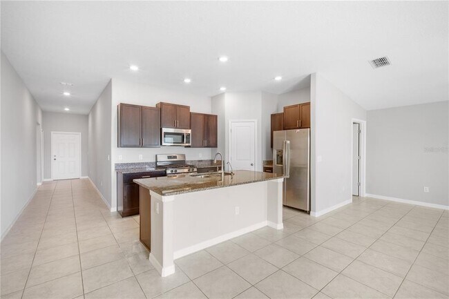 Building Photo - 10390 Scarlet Skimmer Dr
