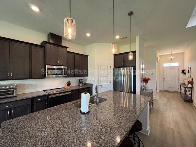 Building Photo - 5641 Micanopy Dr