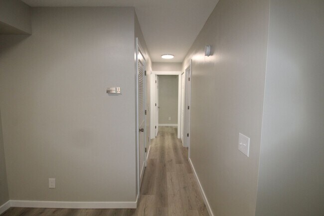Building Photo - Stunning Fully Remodeled 3BR Condo at Madison Manor – Available This July!