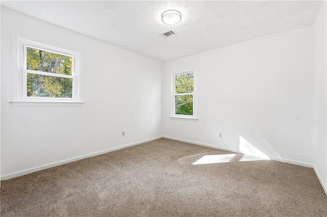 Building Photo - 6917 Laurel Wood Dr