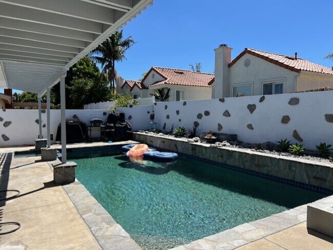 Building Photo - Coastal Elegance Meets Family Comfort in D...