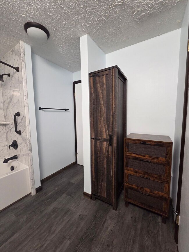 Building Photo - Serene Living in a Quiet Lakeside Community