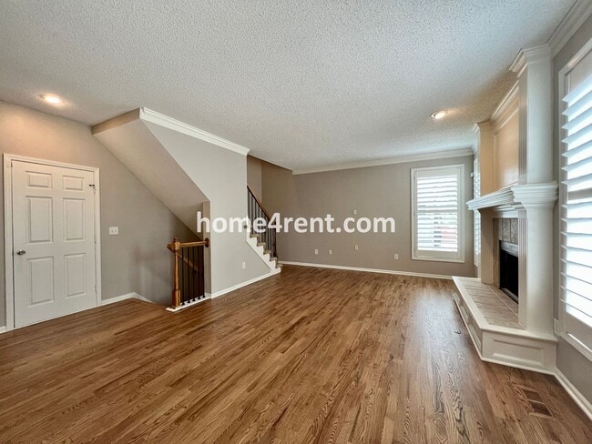 Building Photo - Updated Kitchen, Large Two Tiered Deck, Finished Basement in Blue Valley Schools!