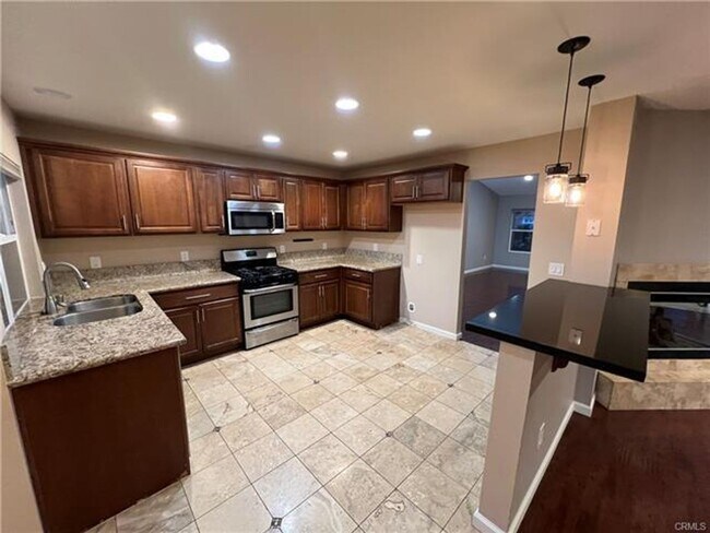 Building Photo - Stunning Pool Home in Menifee with Three-C...