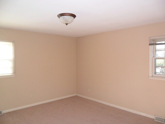 Building Photo - COMING SOON! Spacious Home w/ Finished Basement, Fenced Backyard & Garage!