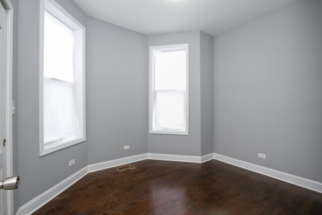 Building Photo - 7322 S Langley Ave