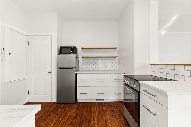 Building Photo - Charming Updated Home with Loft & Secure A...