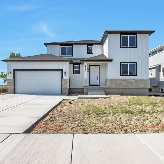 Building Photo - ALMOST NEW MODERN LEHI HOME 3 CAR GARAGE O...