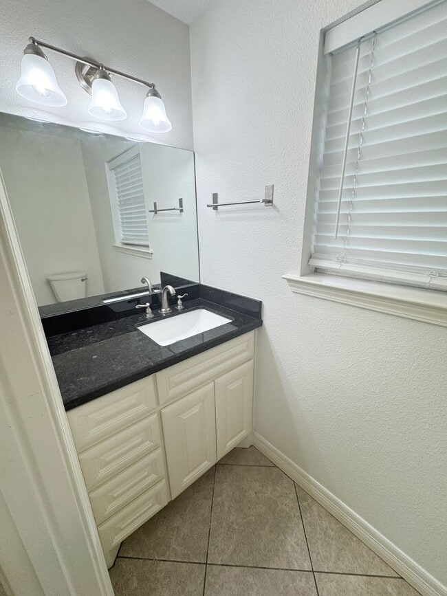 Building Photo - 310 W Pineshadows Dr