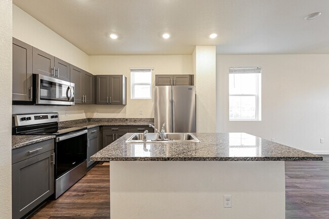 Building Photo - Bright 3-Bedroom End-Unit Townhome