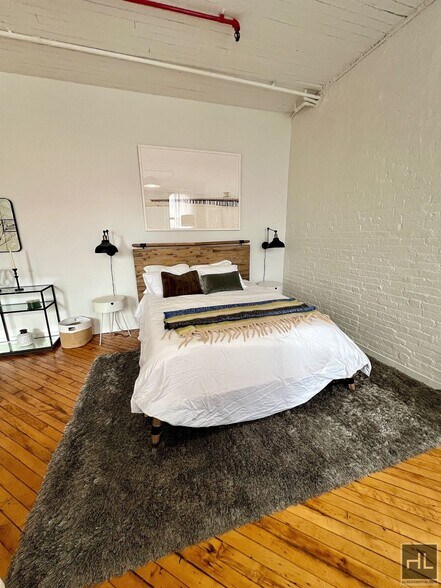 Building Photo - Clock Tower Industrial Loft Studio w/ Pool, Sauna, Rooftop Greenhouse & More Near South Bronx Wat...