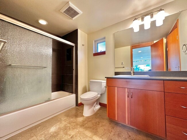 Building Photo - Three-Level Loft-Style 2BR | 3BA with Priv...